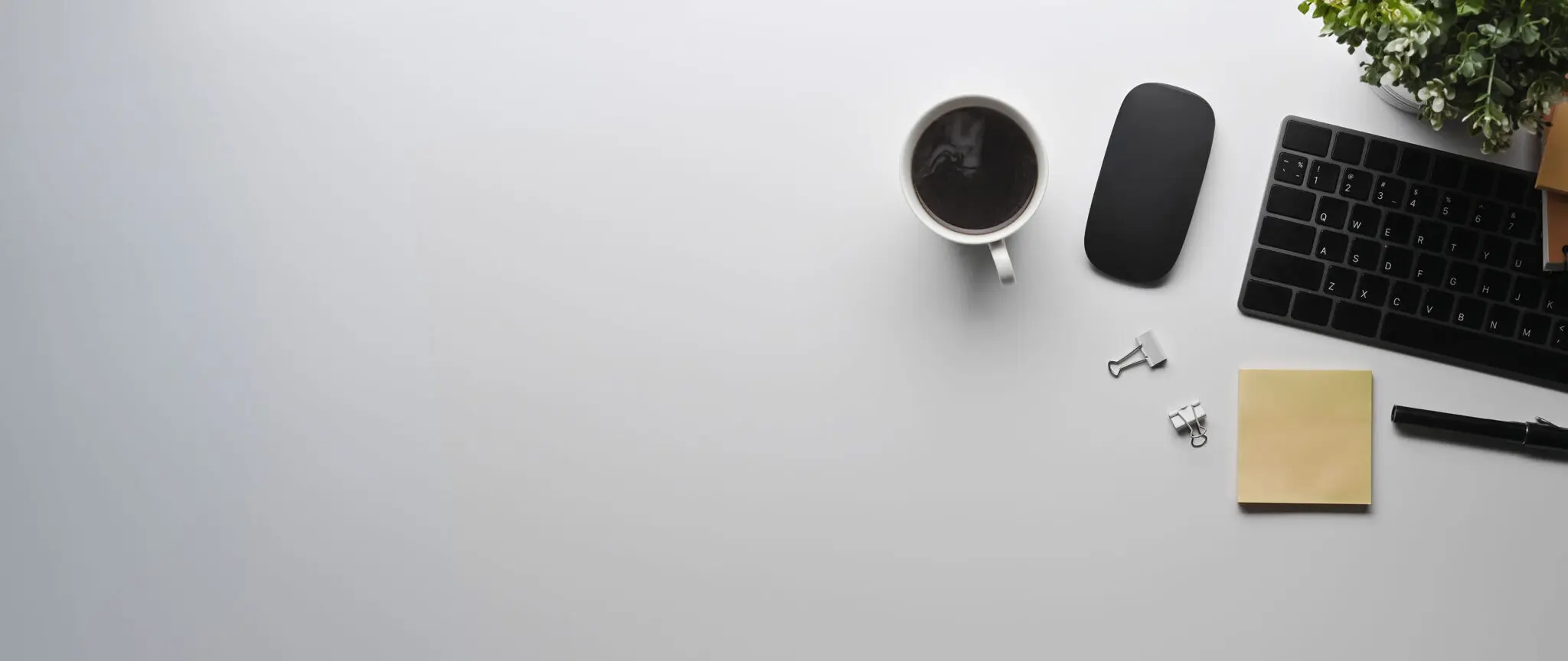 top-view-cup-of-coffee-sticky-note-wireless-keyb-2024-12-04-06-17-33-1utc-scaled